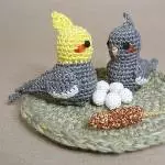 Nest mit Nymphen und Hirse